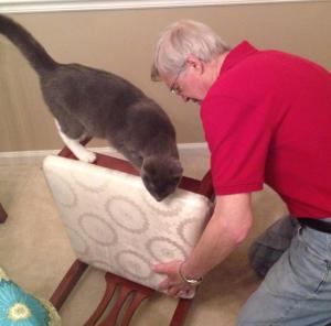 Dad and Elvis fixing a chair
